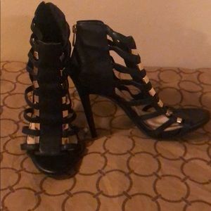 Black and gold heels